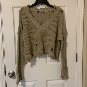 Distressed oversized crop sweater